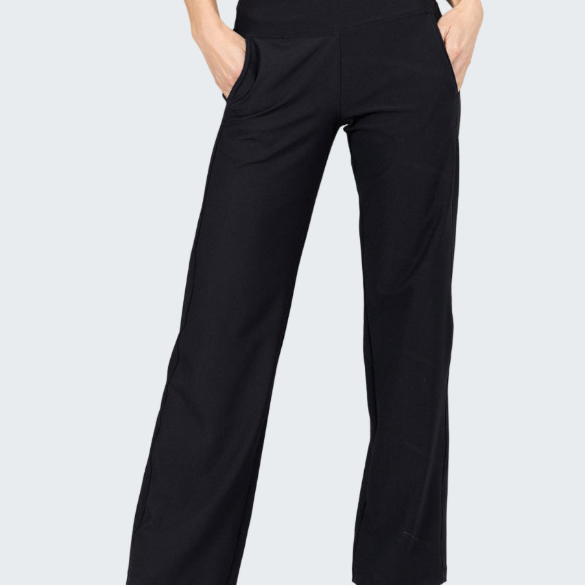 Black wide-leg pants worn by a person on a gray background