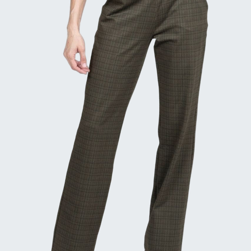 Brown plaid pants worn by a person on a white background
