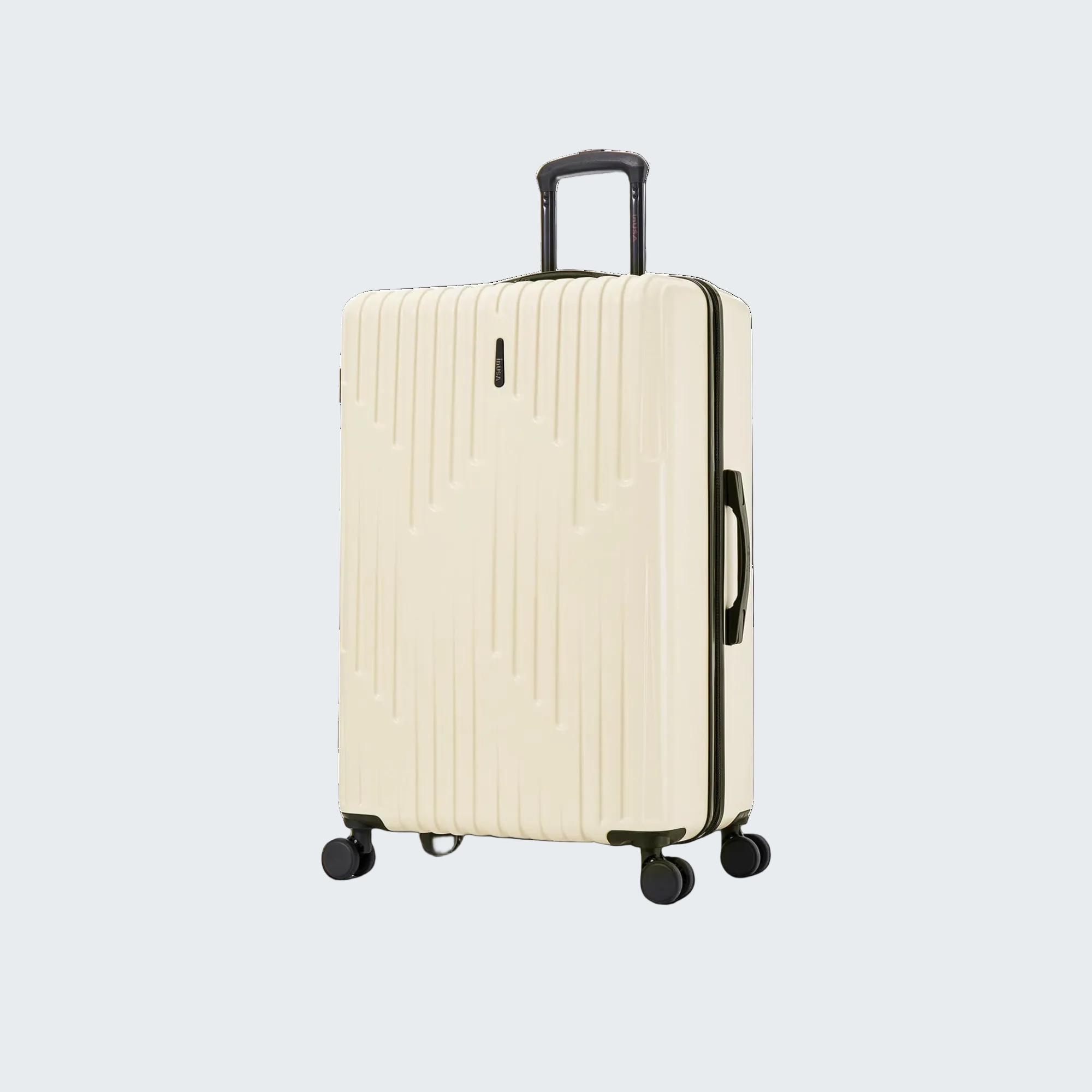 Beige suitcase with black handle and wheels on a white background