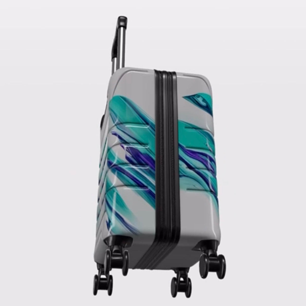 Gray suitcase with blue and green abstract design on a white background
