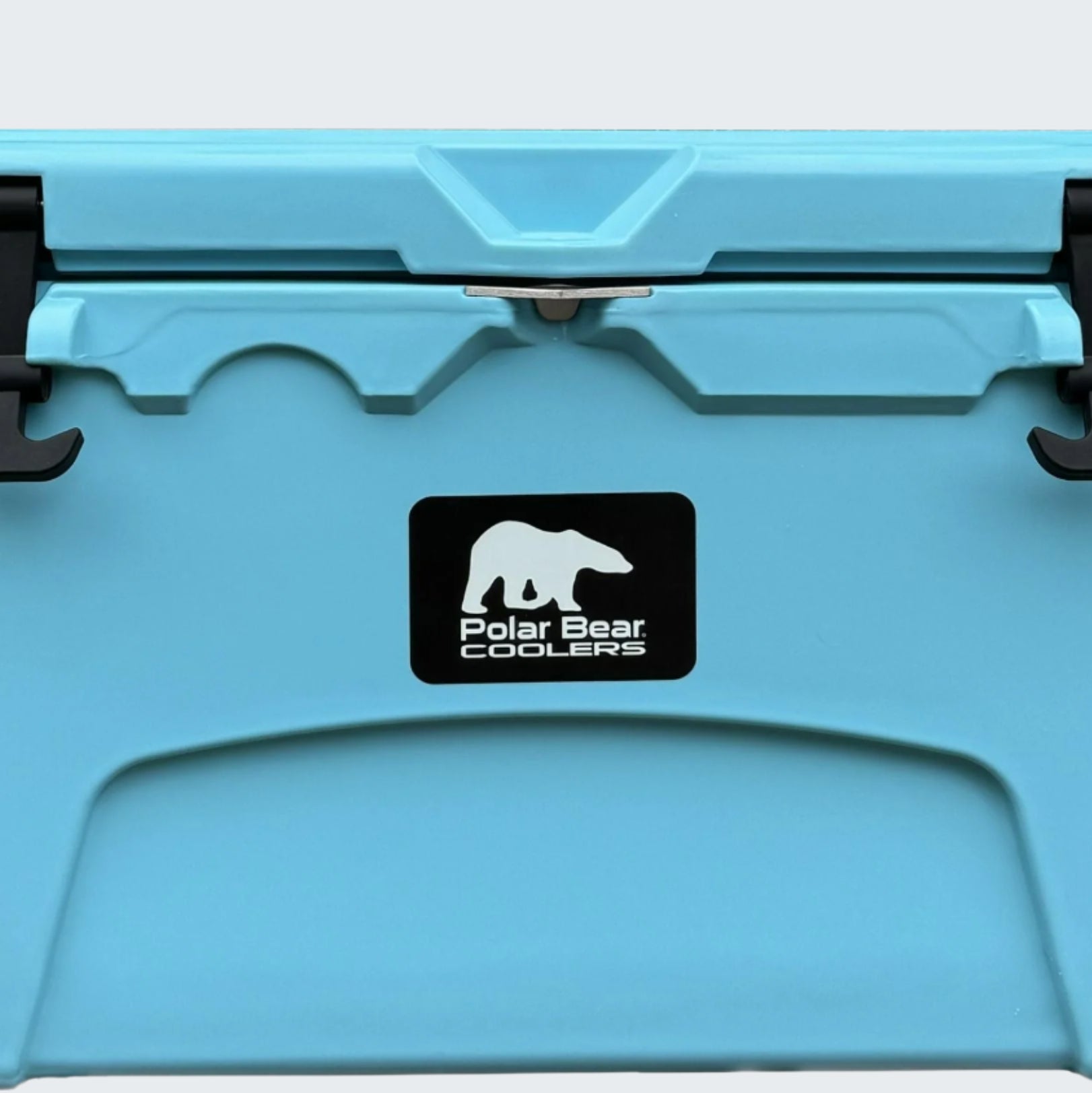 Blue cooler with Polar Bear Coolers logo on a white background