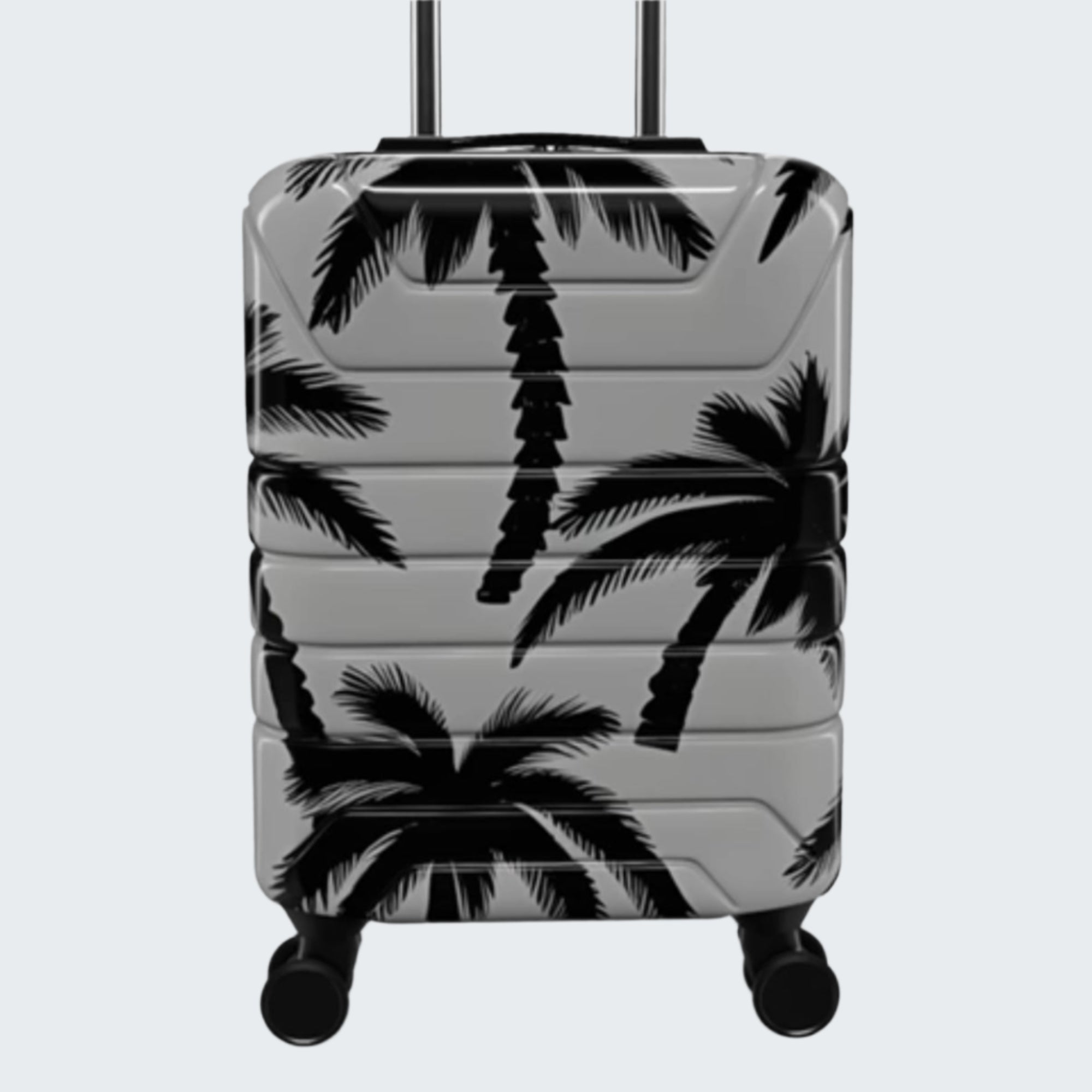Gray suitcase with black palm tree patterns on a light gray background