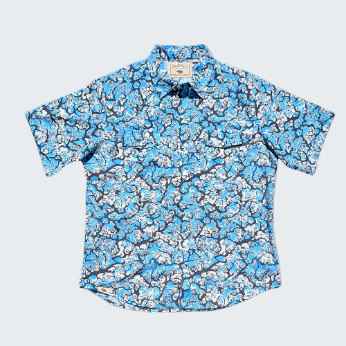 Blue floral patterned shirt on a white background