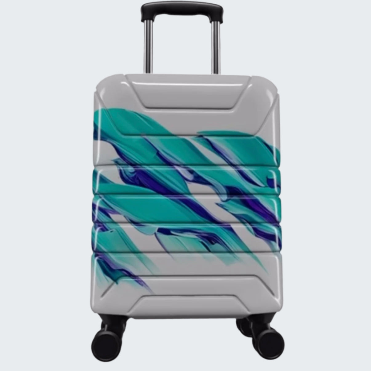Silver suitcase with blue and green abstract design on a white background