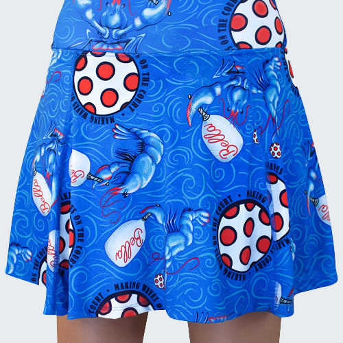 Blue skirt with lobster and polka dot pattern on a white background