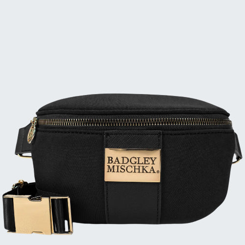Black waist bag with gold zipper and Badgley Mischka label on a white background