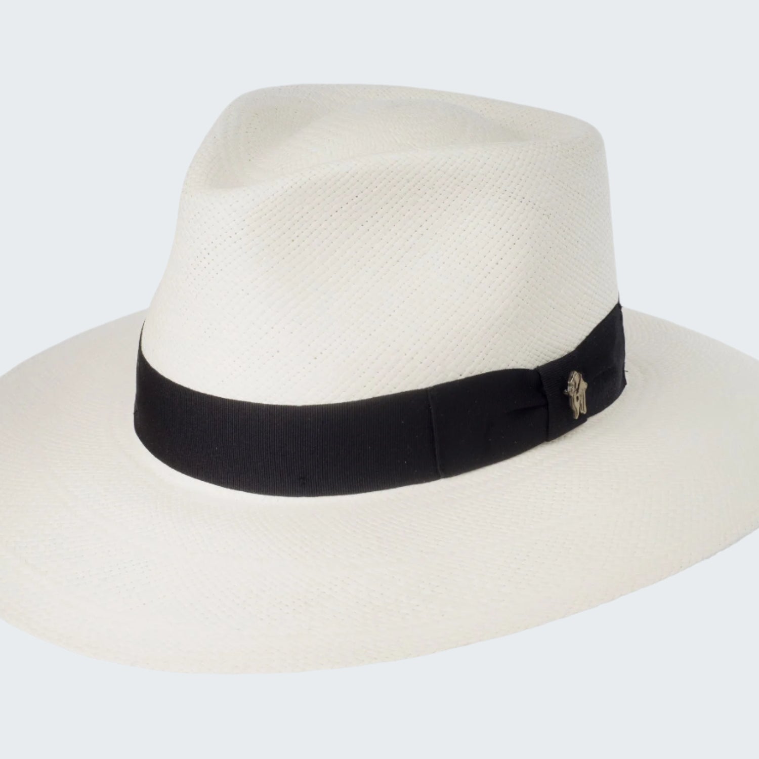 White fedora hat with a black band on a white background