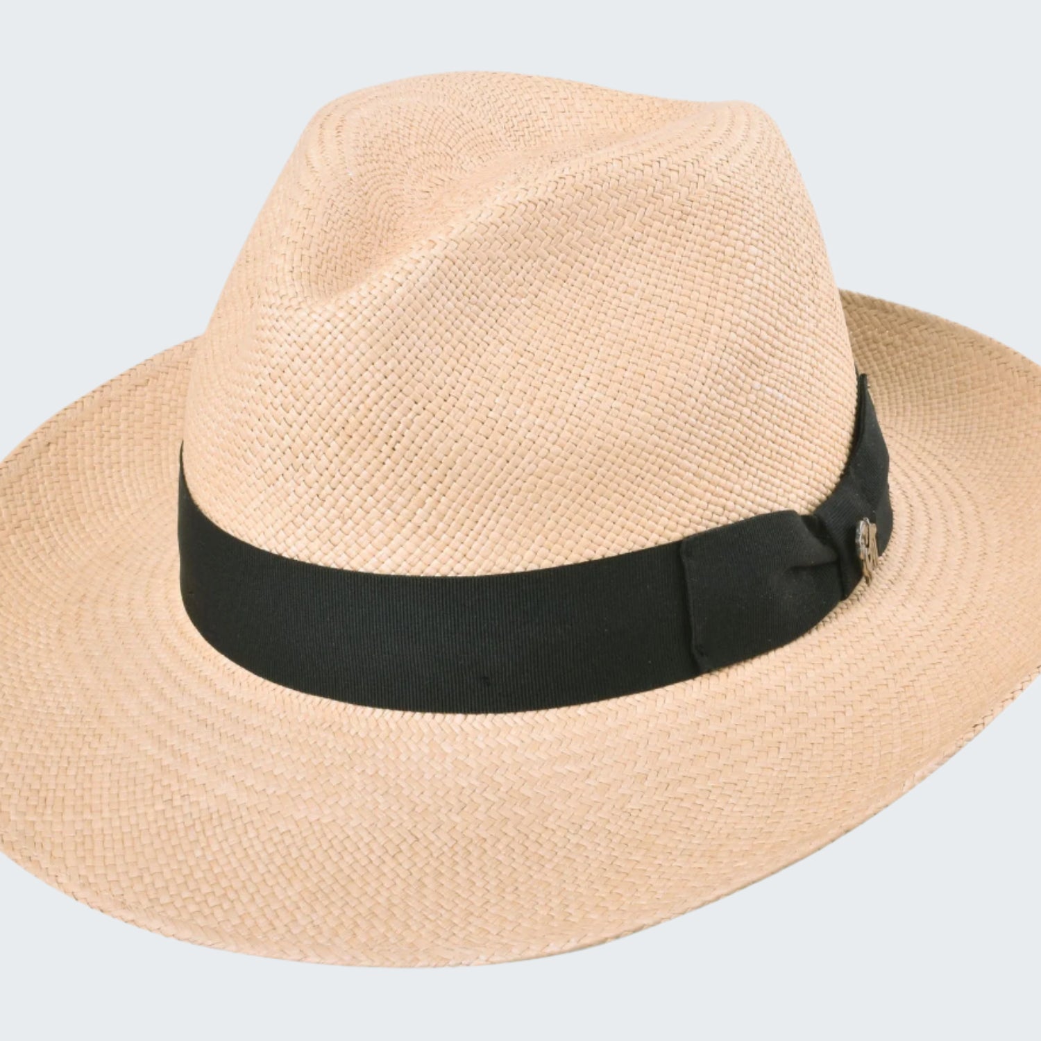 Beige straw hat with a black band on a white background