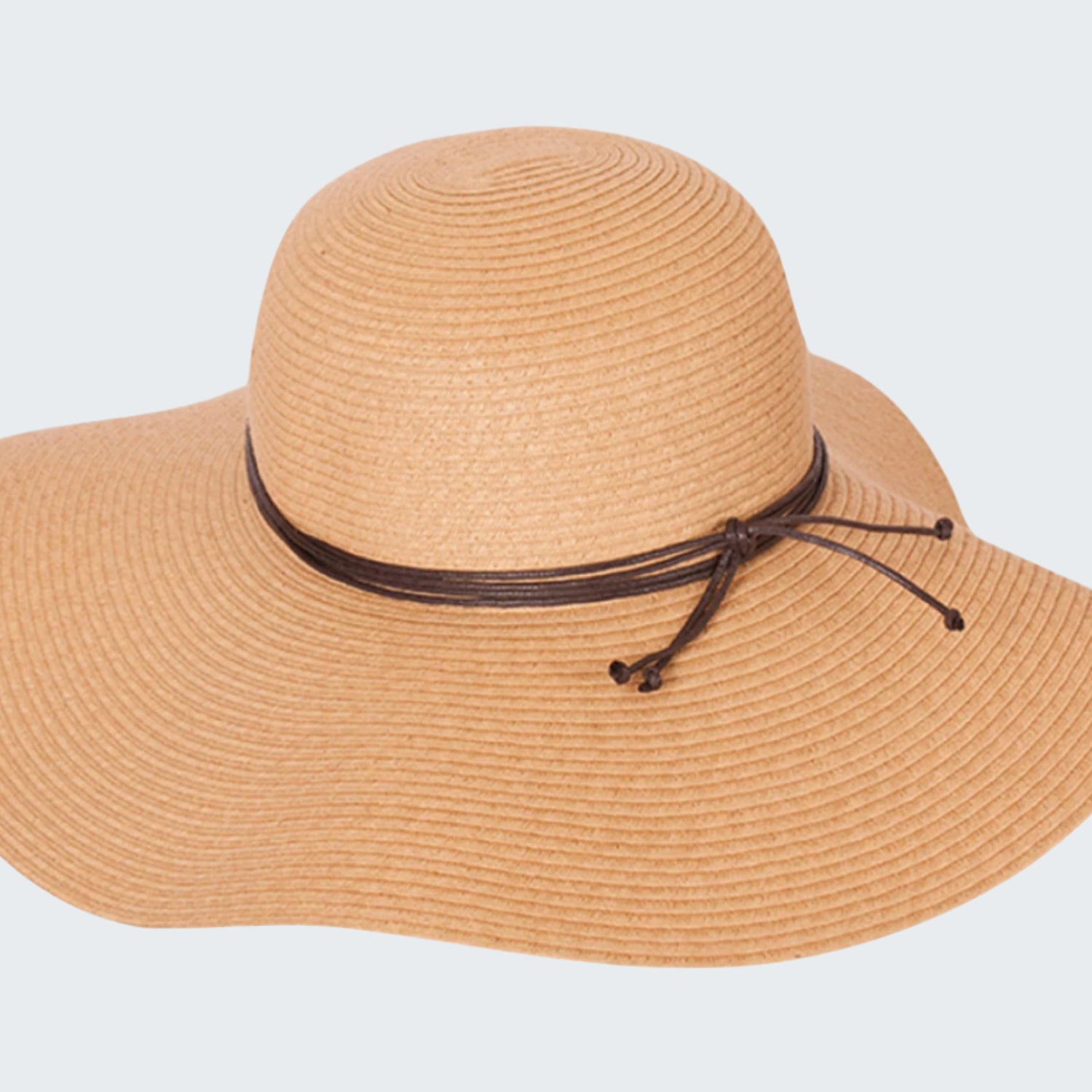 Beige straw hat with a brown band on a white background