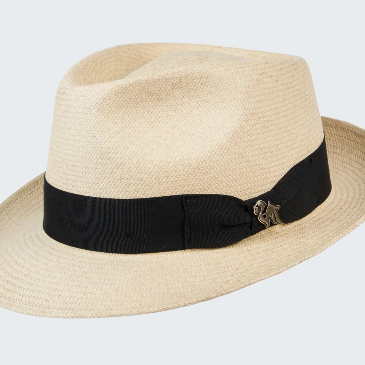 Beige straw hat with a black band on a white background