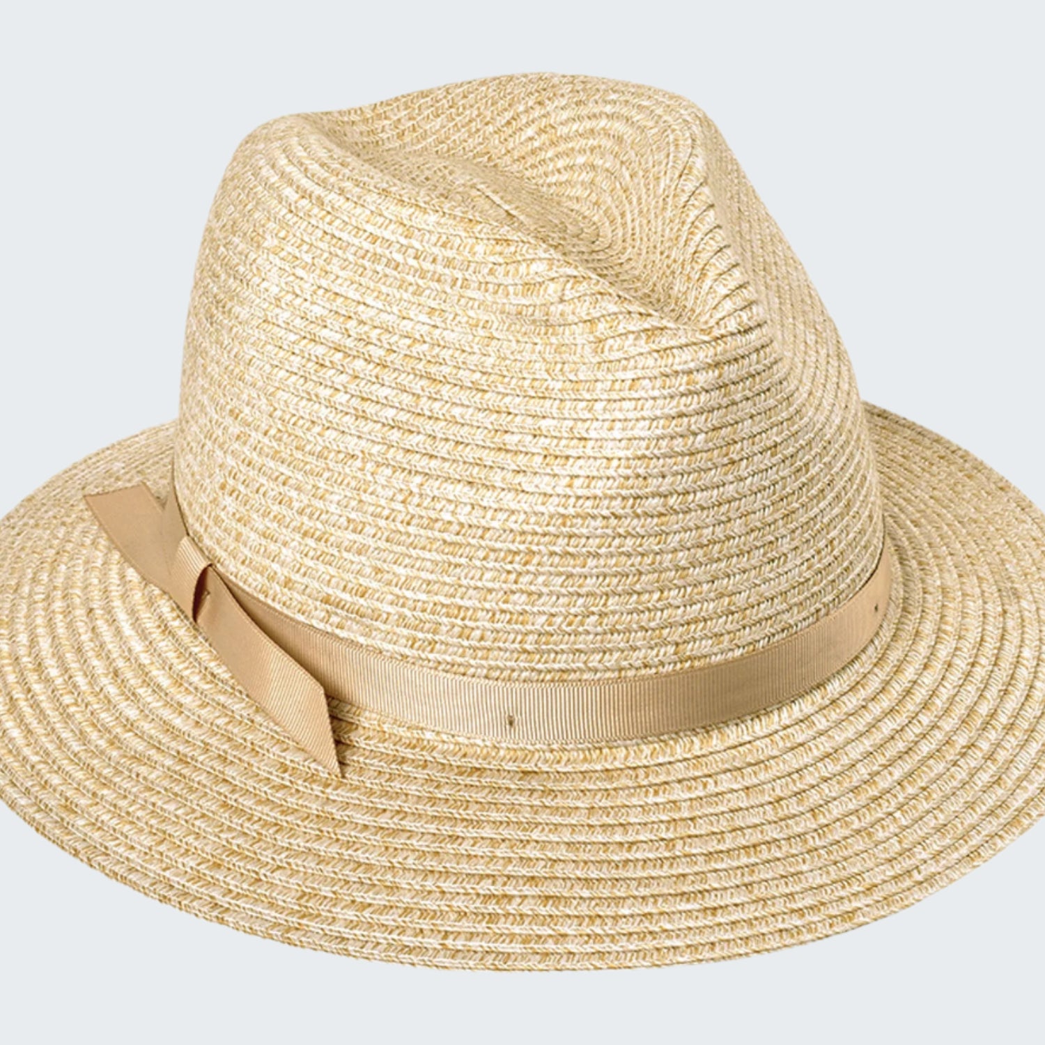 Beige straw hat with a ribbon on a white background
