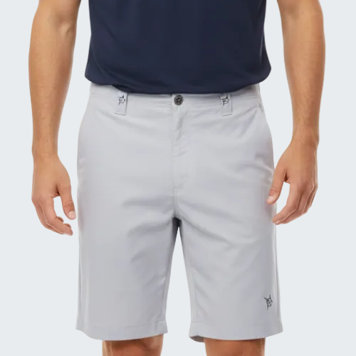 Person wearing light gray shorts and a navy blue shirt on a white background