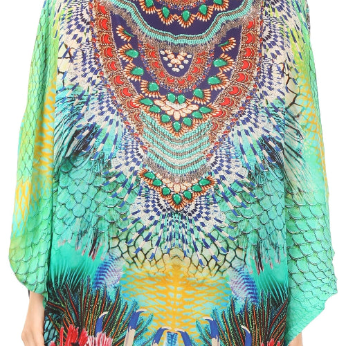 Colorful patterned poncho worn by a person on a white background