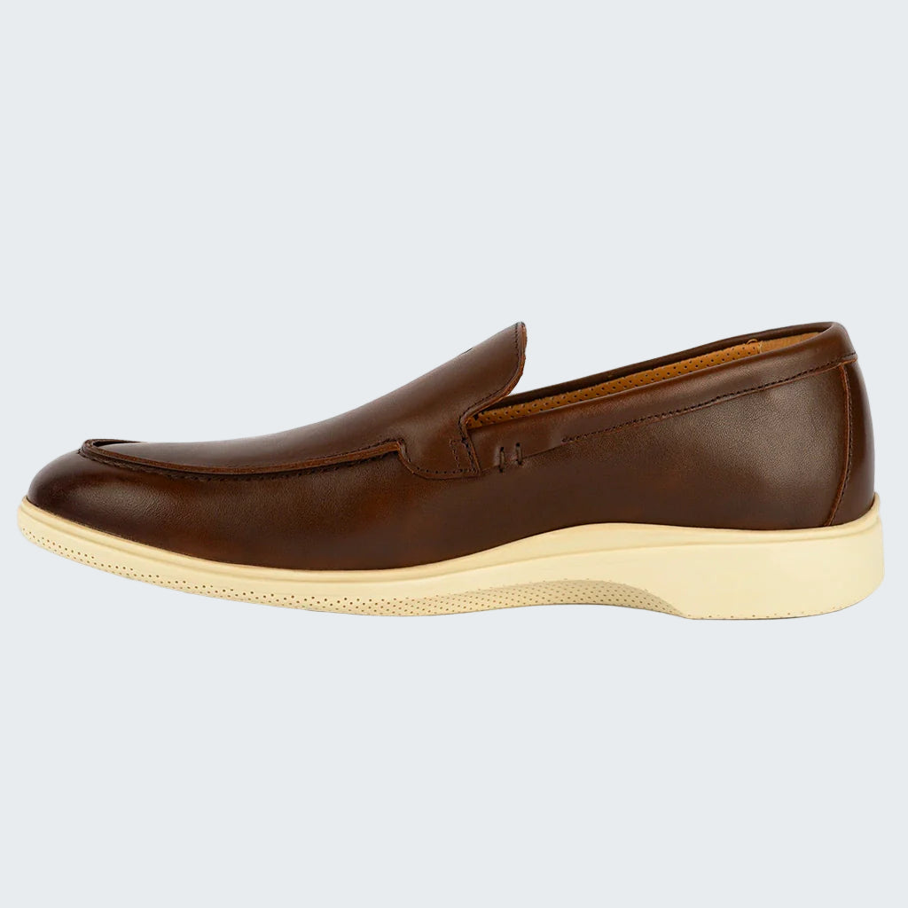 Brown leather loafer shoe on a white background