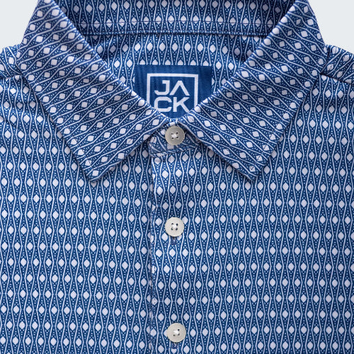 Blue patterned shirt with a brand logo on a white background