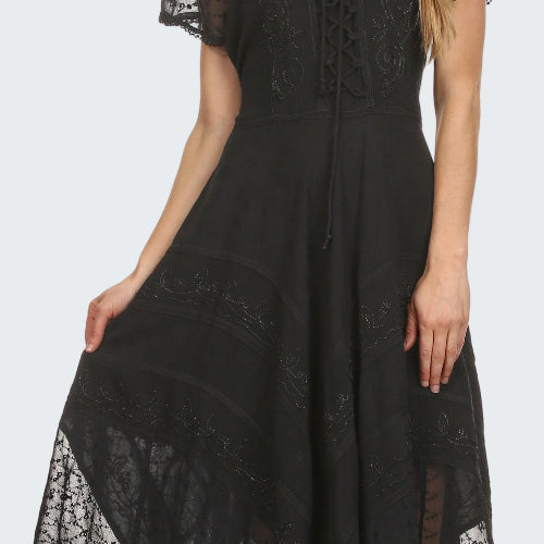 Black lace dress worn by a model on a white background