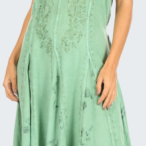 Green sleeveless dress with floral pattern on a white background