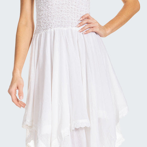 White dress with thin straps on a white background