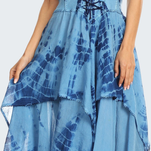 Blue tie-dye dress with a lace-up front, worn by a model on a white background