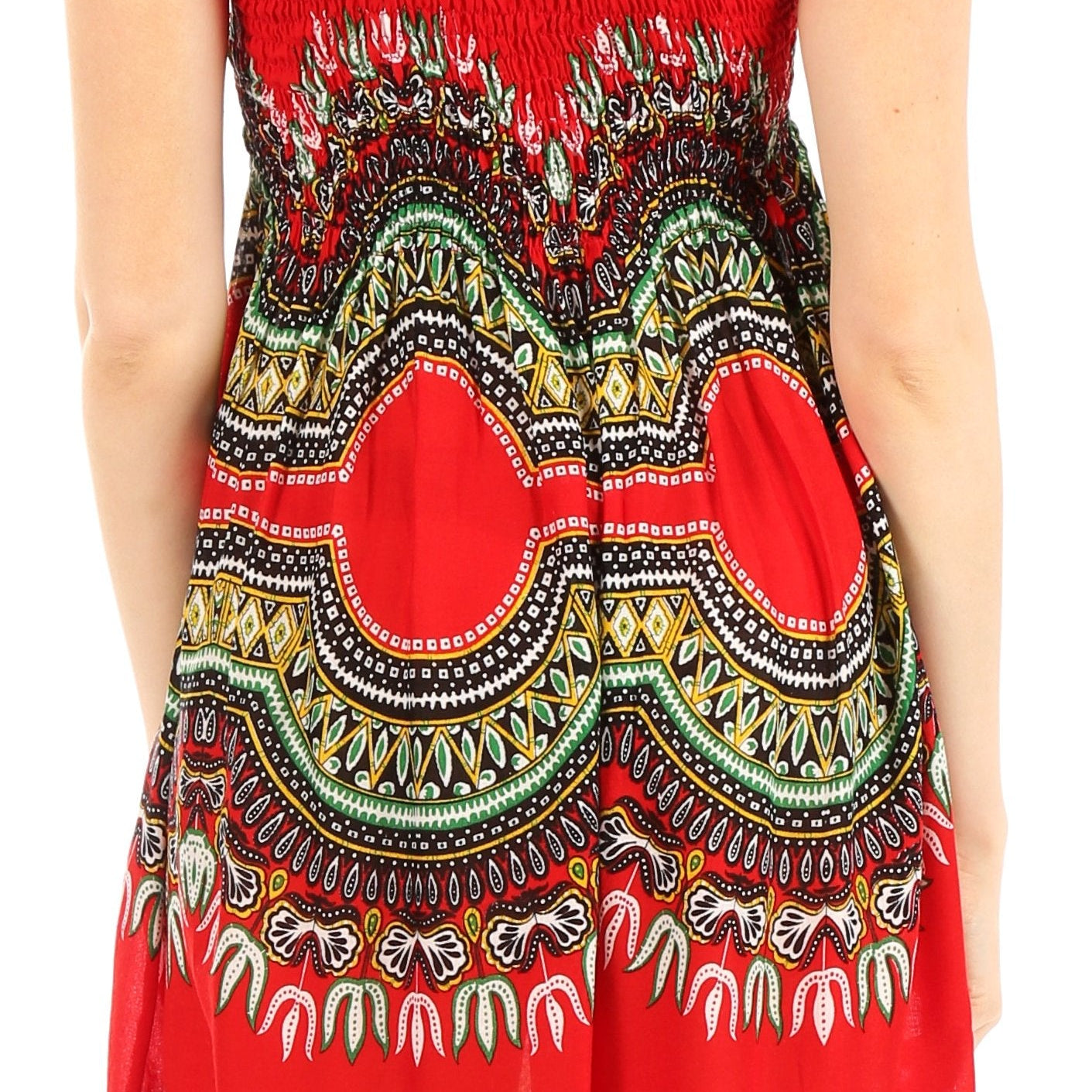 Woman wearing a red dress with intricate patterns