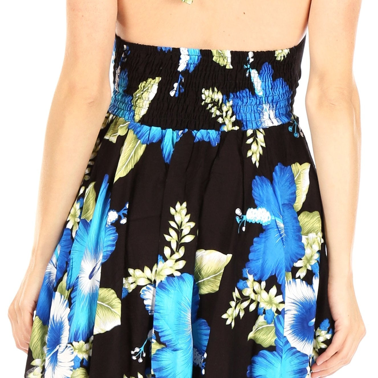 Woman wearing a floral dress with a black background