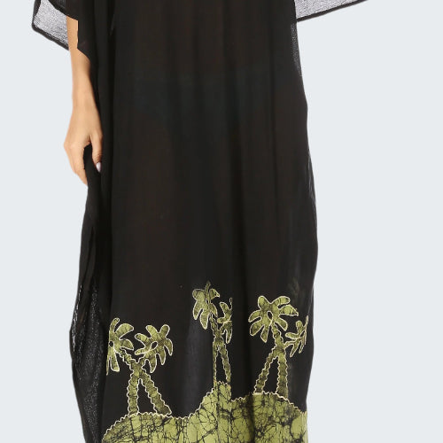 Black dress with green floral embroidery on a white background