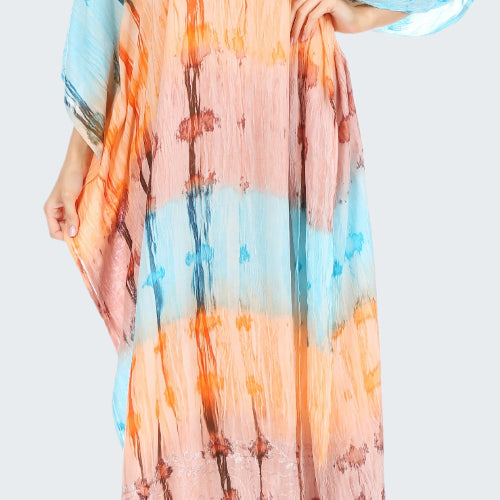Colorful tie-dye dress with a pattern on a white background