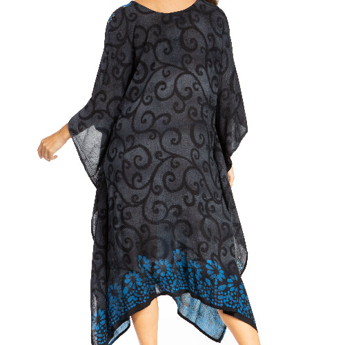 Woman wearing a black and blue patterned dress on a white background