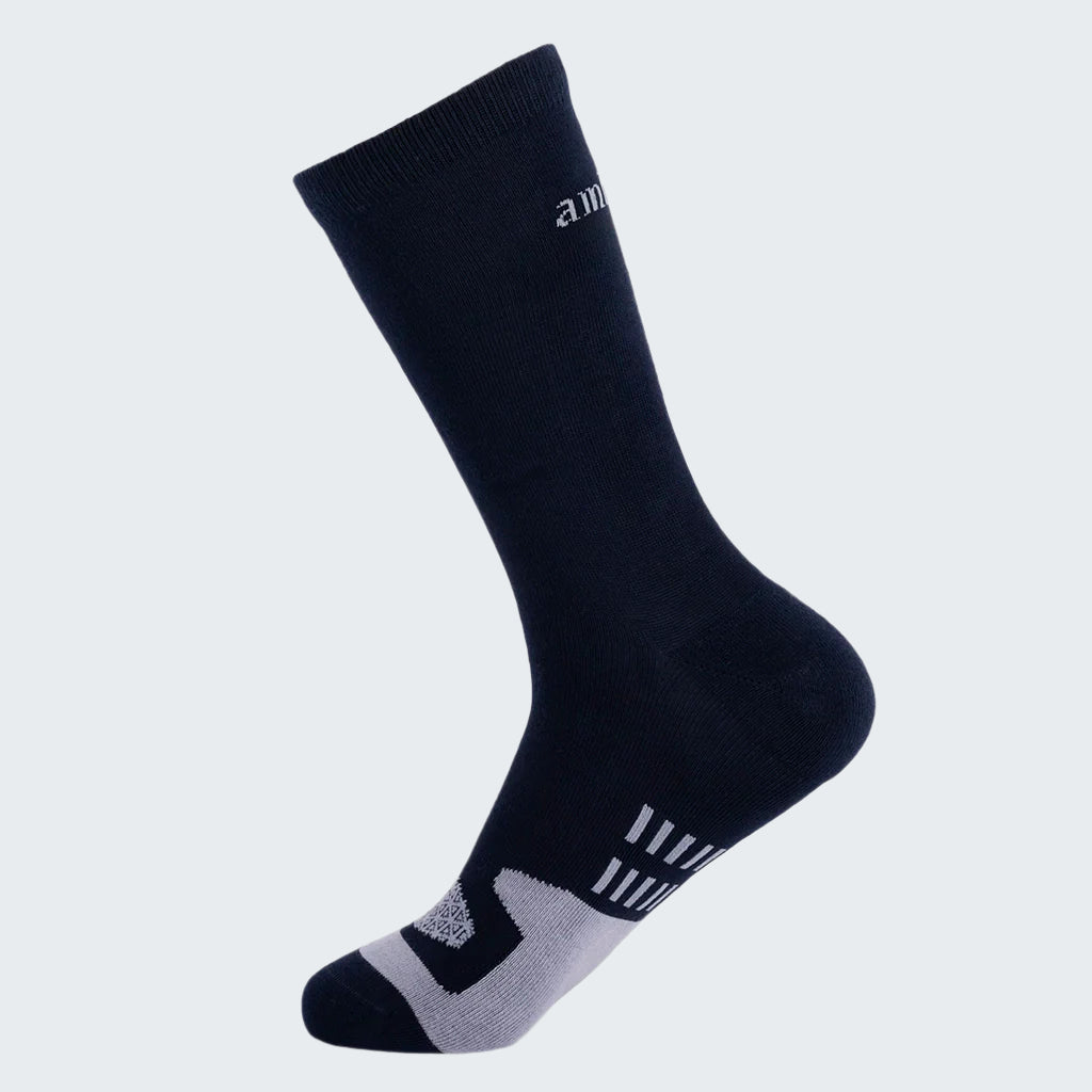 Black sock with gray heel and toe on a white background