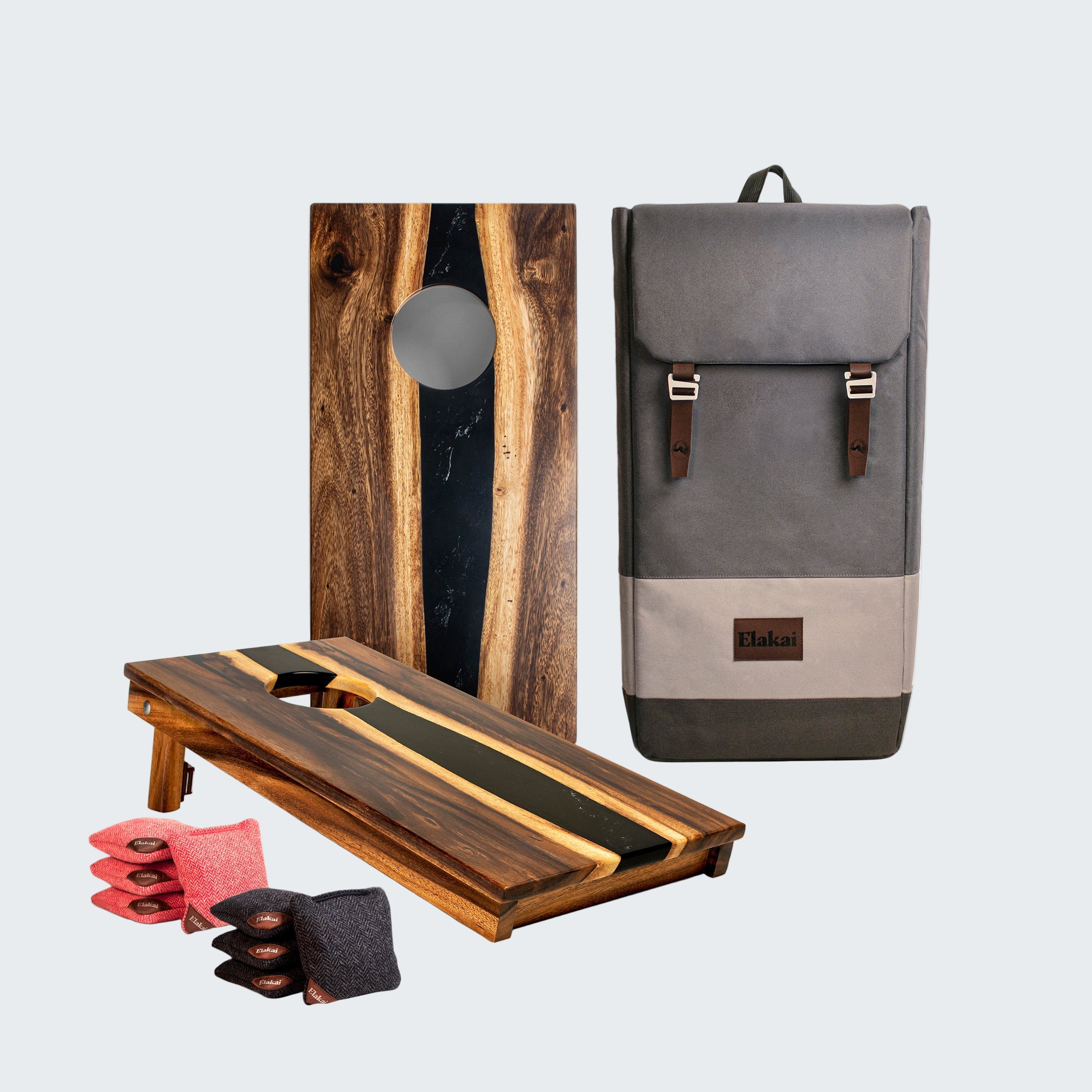 Wooden board game set with bags on a white background