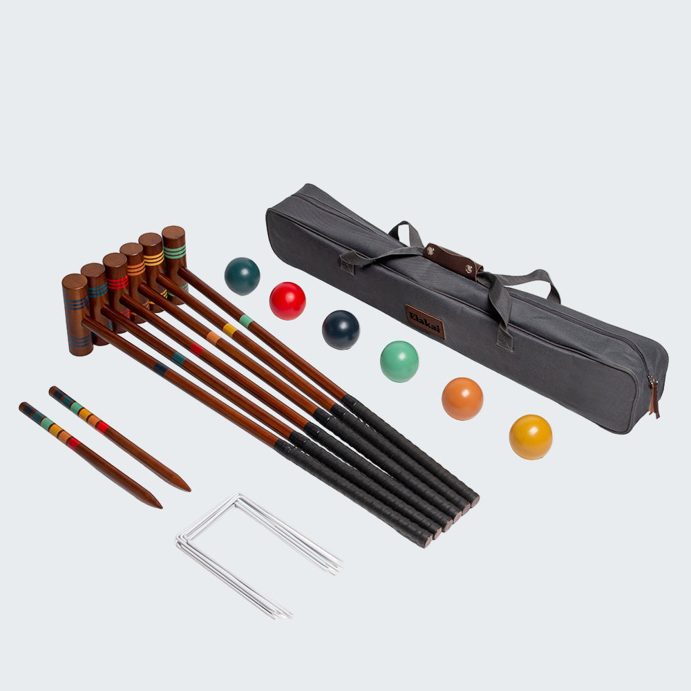 Croquet set with wooden mallets, balls, and carrying case on a white background
