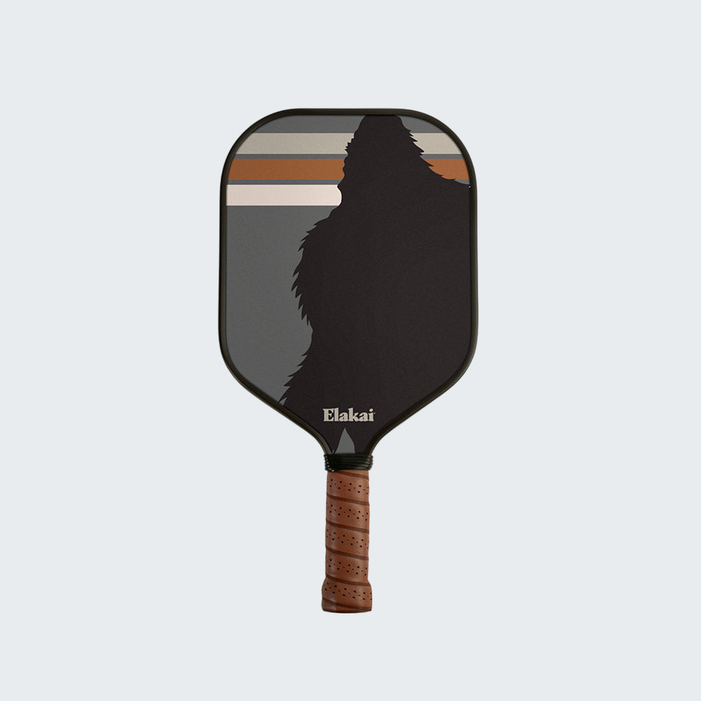 Pickleball paddle with a silhouette design and 'Elakai' branding on a white background