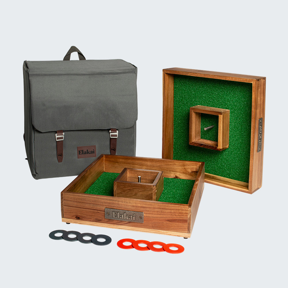 Wooden ring toss game set with backpack on a white background