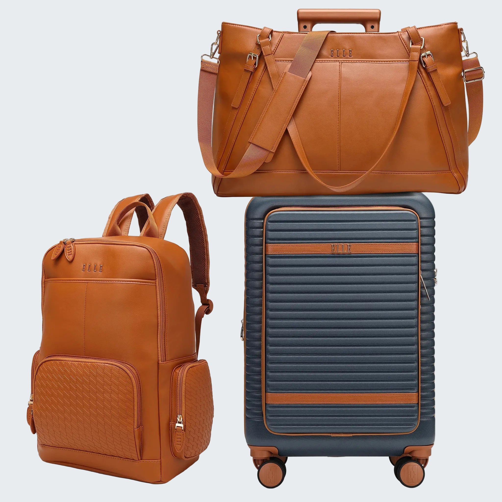 Brown leather bag and blue suitcase with brown accents on a white background