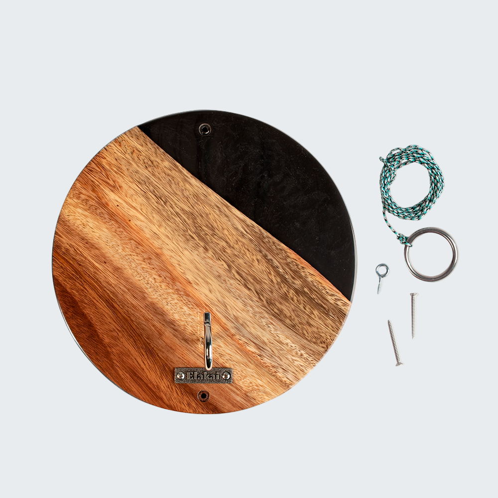 Wooden wall clock with installation hardware on a white background