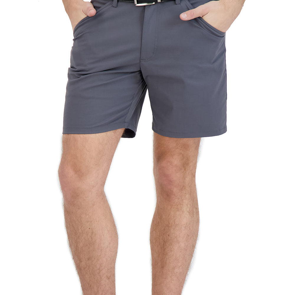 Person wearing gray shorts, a white shirt, and black high-top sneakers on a white background