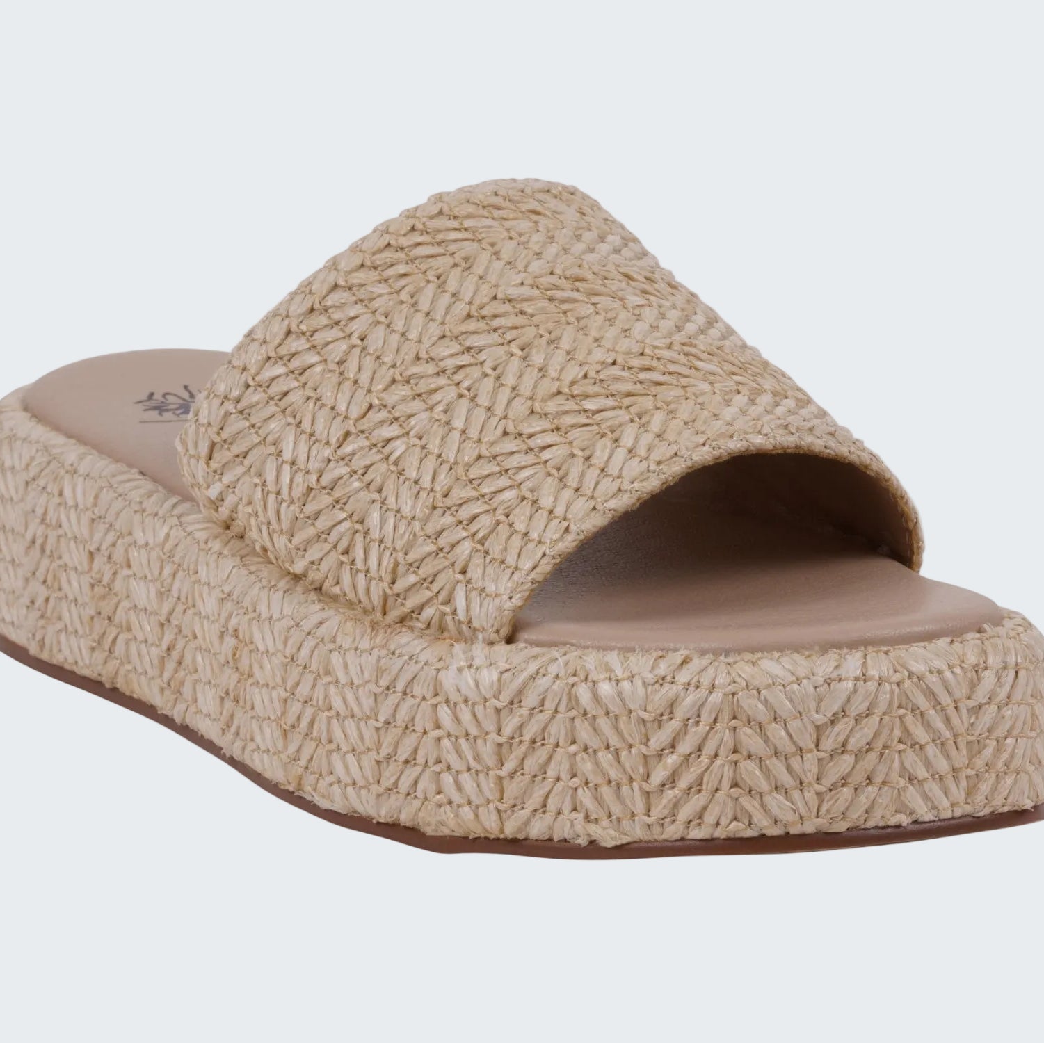 Beige woven sandal on a white background