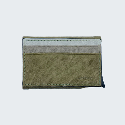 Green cardholder with a white interior on a light gray background