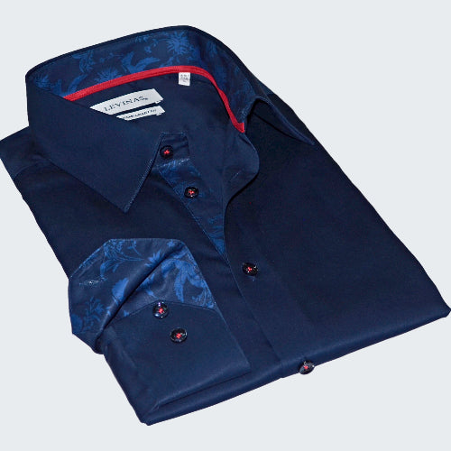 Folded navy blue shirt with red accents on a white background