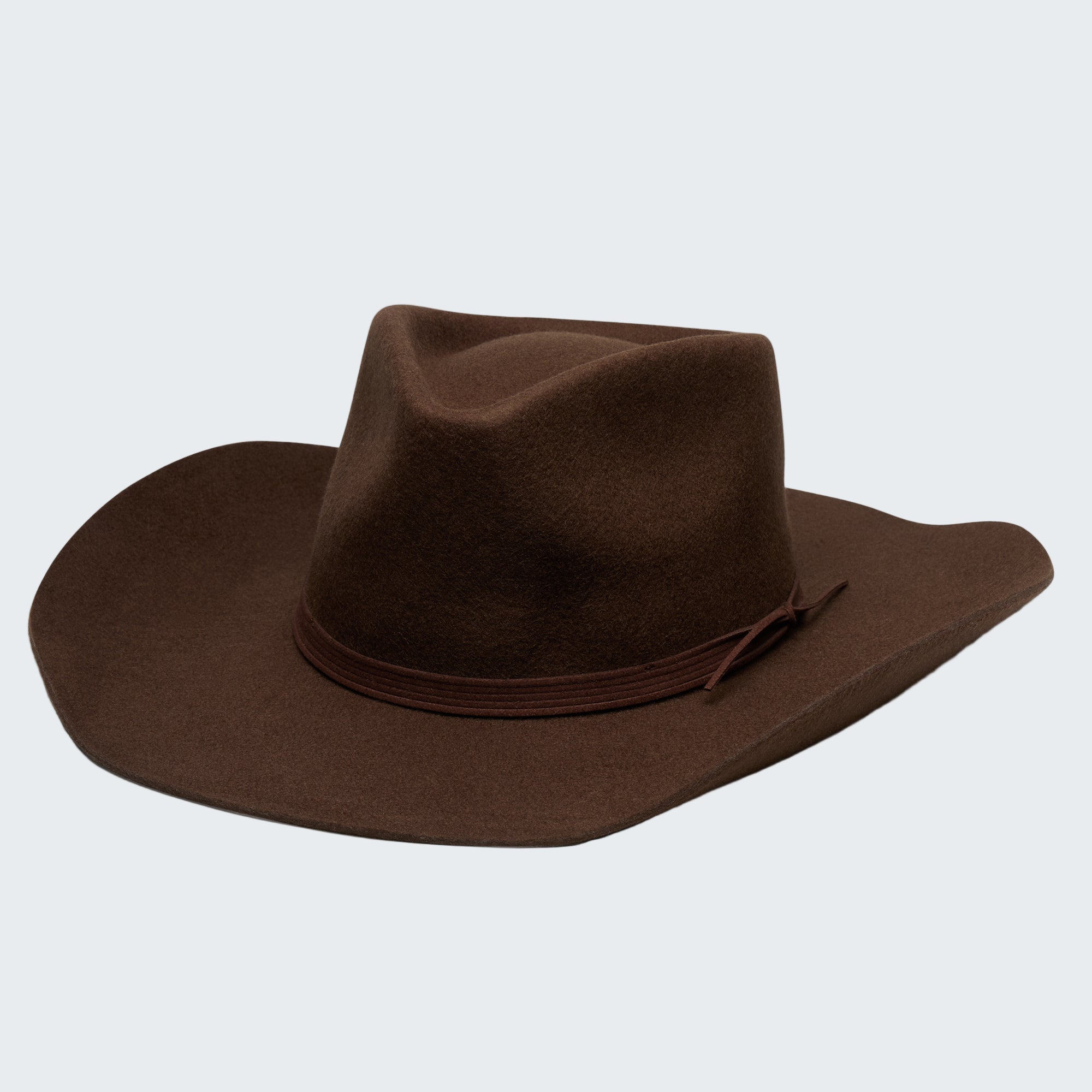 Brown cowboy hat on a white background