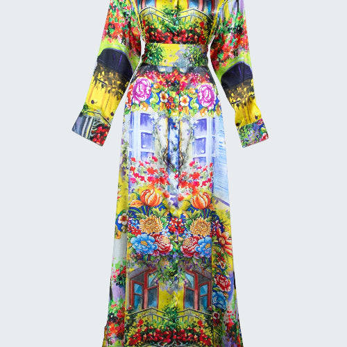 Colorful dress with floral and architectural print on a white background