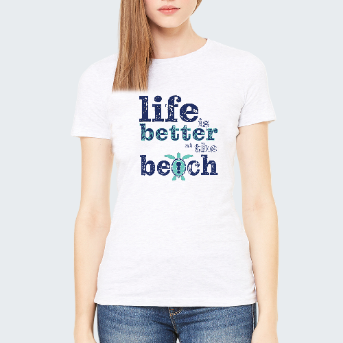 Person wearing a white t-shirt with 'Life is better at the beach' text and graphic.