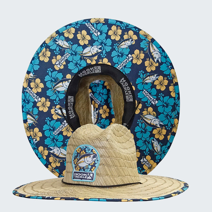 Wide-brimmed hat with floral and fish patterned visor on a white background