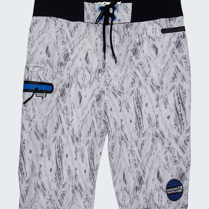 Board shorts with a patterned design on a white background