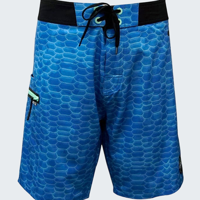 Blue patterned shorts with a black waistband on a white background