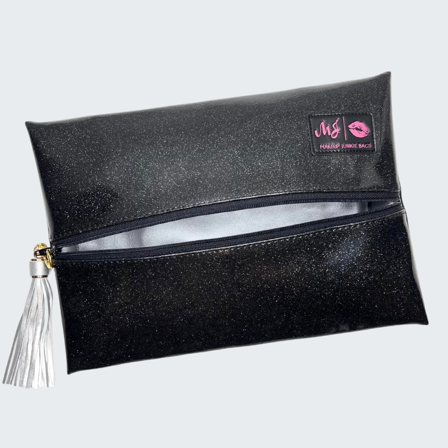 Black glittery makeup bag with a visible brand logo on a white background