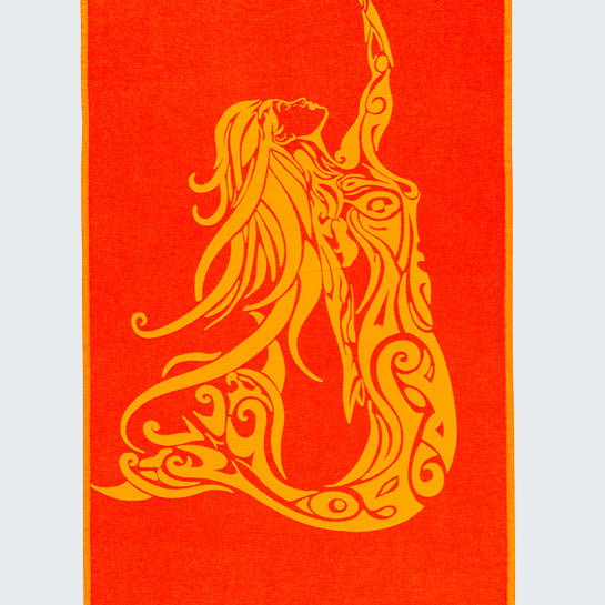 Decorative towel with a gold mermaid design on a red background