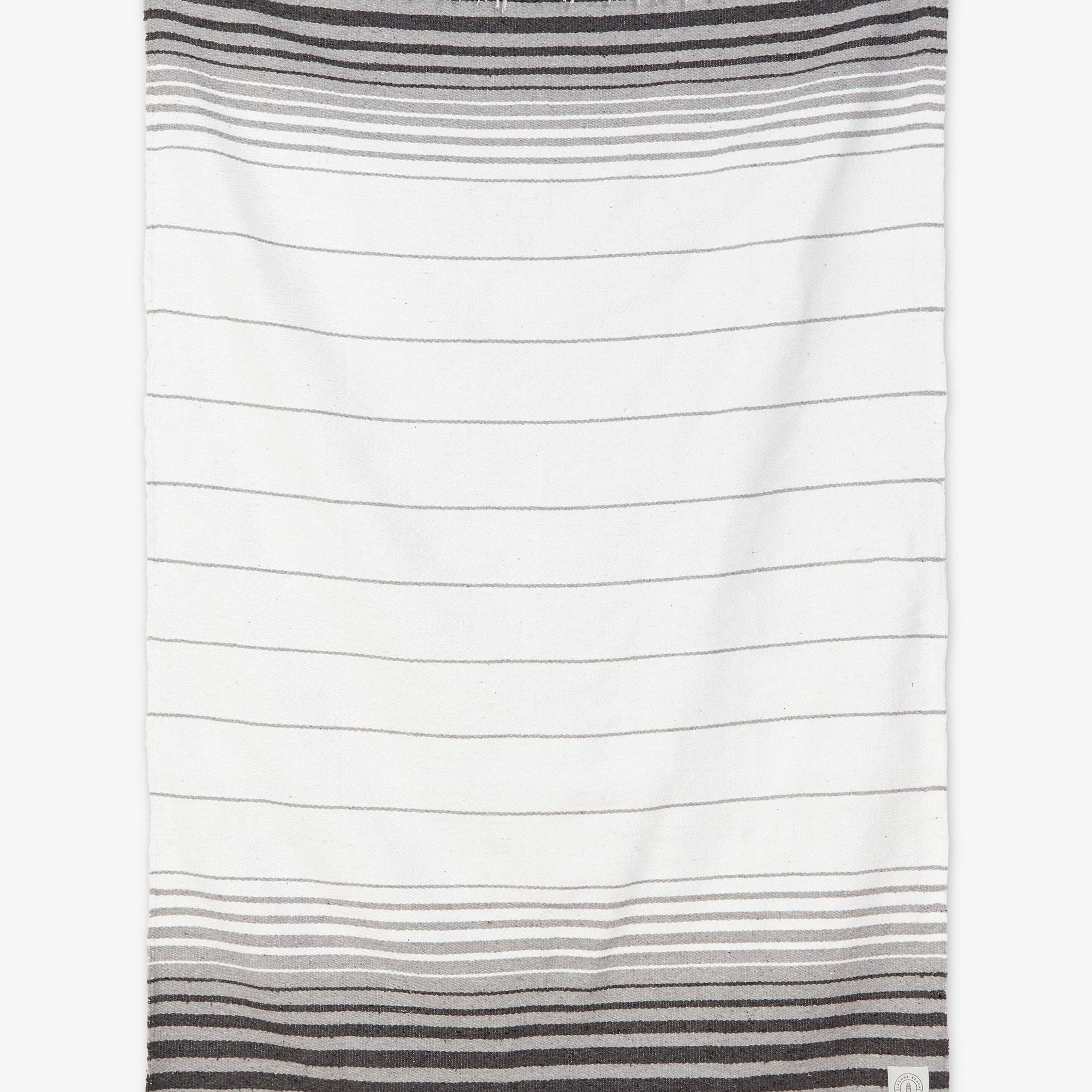 Striped towel with gradient design on a white background