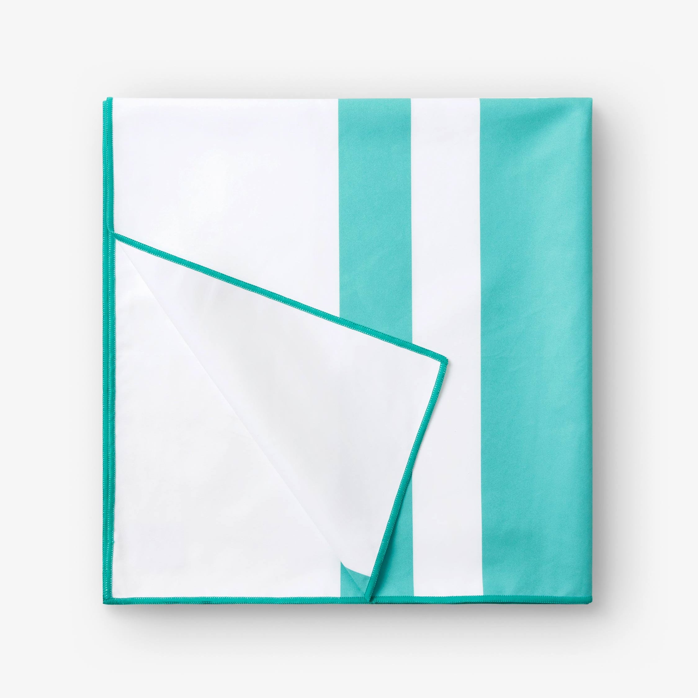 Teal and white striped fabric on a white background
