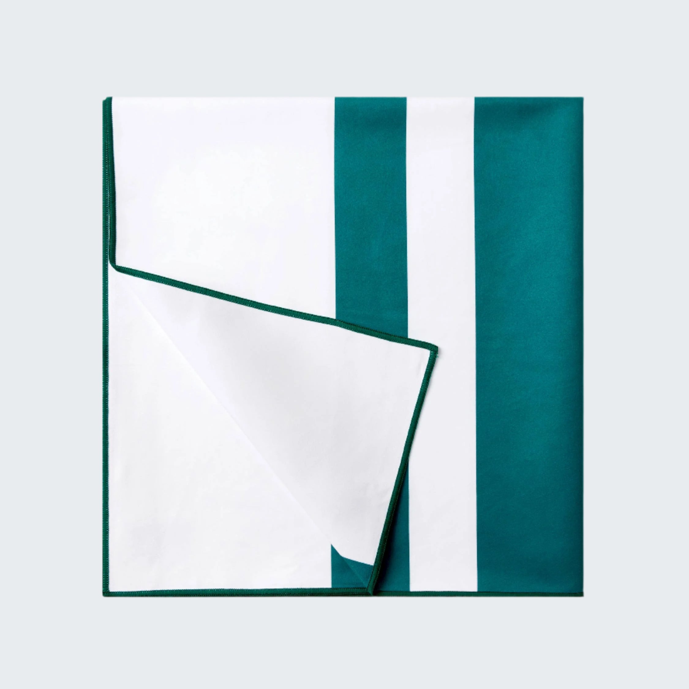 Teal and white striped fabric on a white background